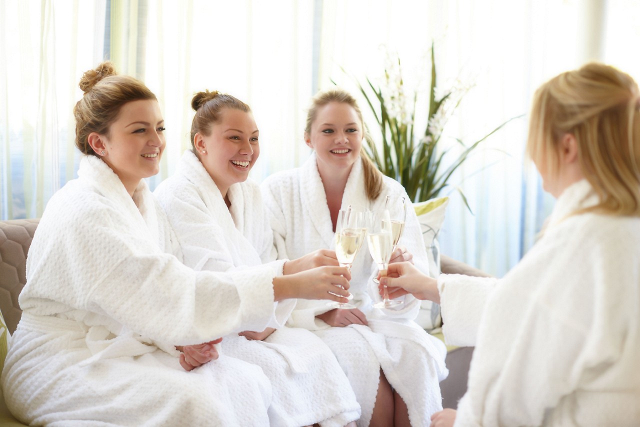 ladies celebrating with champagne